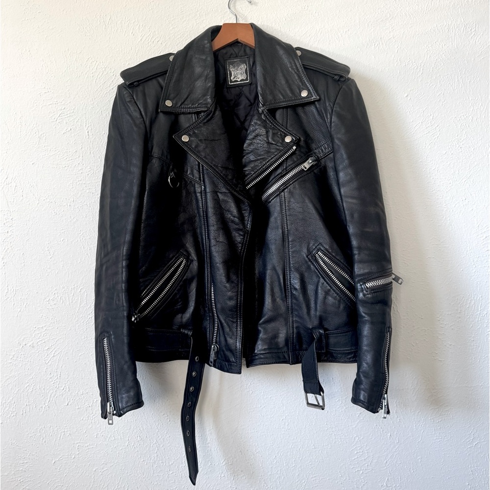 Vintage black leather motorcycle jacket